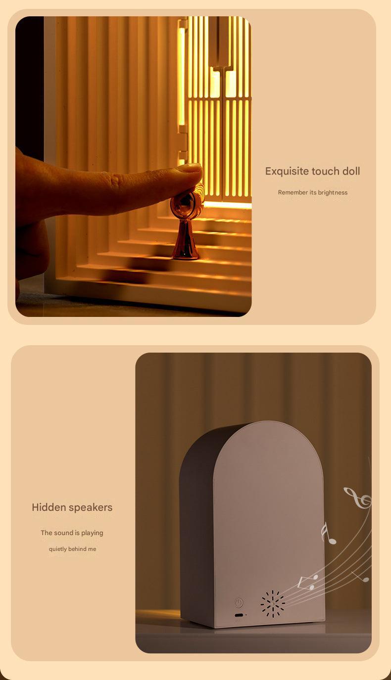 sleek bedside lamp with integrated speaker