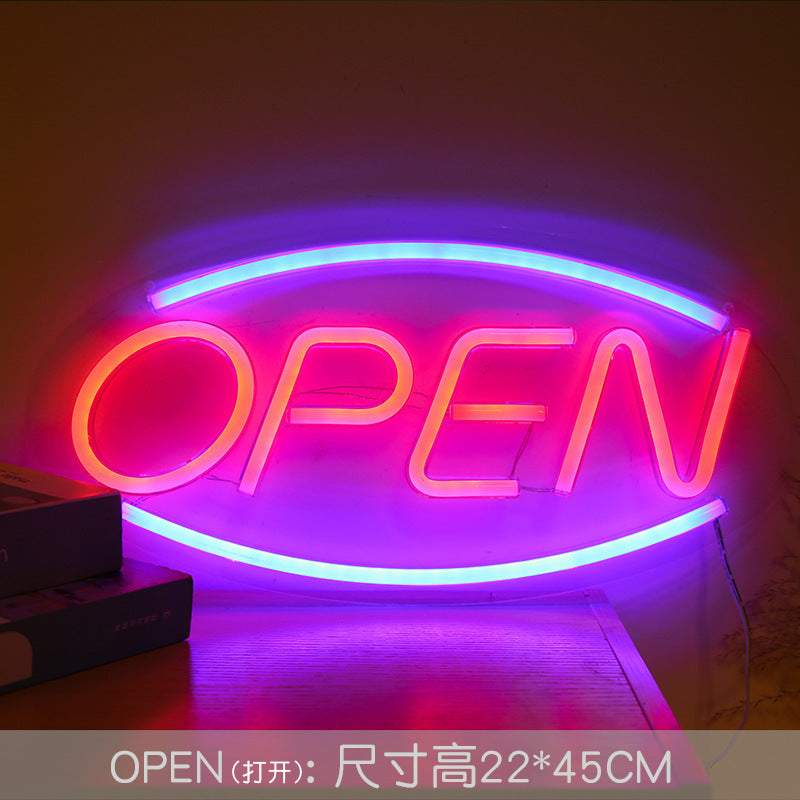 neon sign with victory hand design