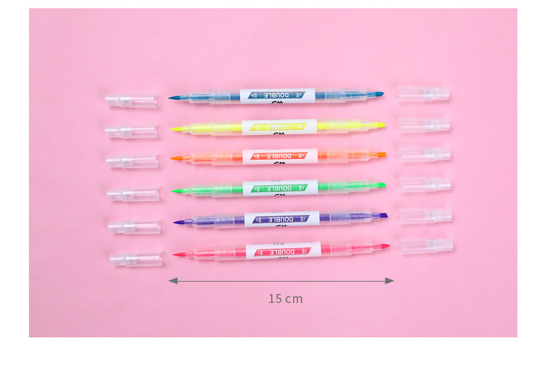 collection of six colored highlighter pens in open packaging