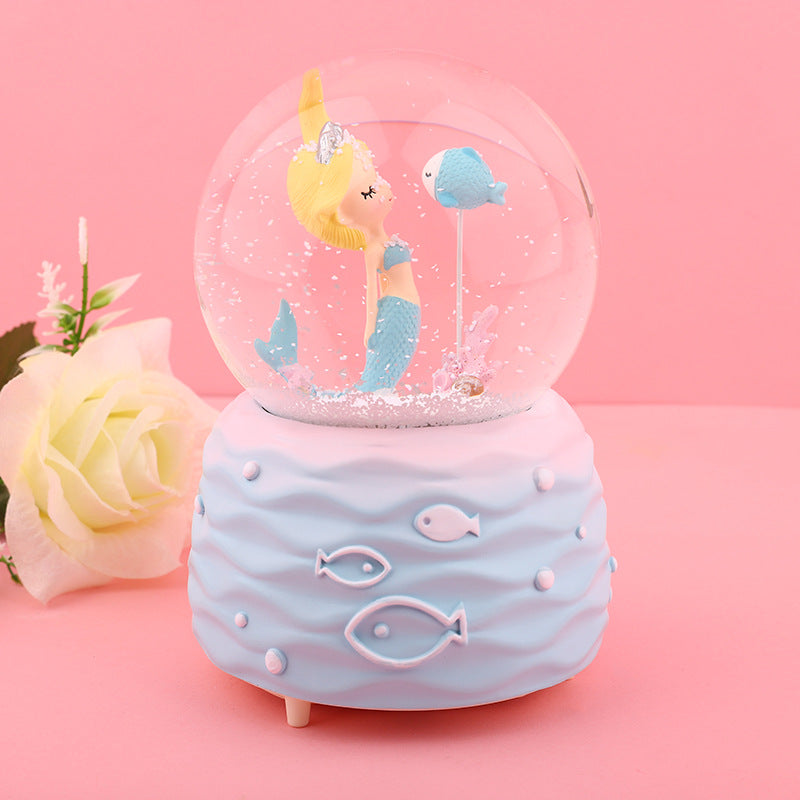 Decorative music box with floating snow