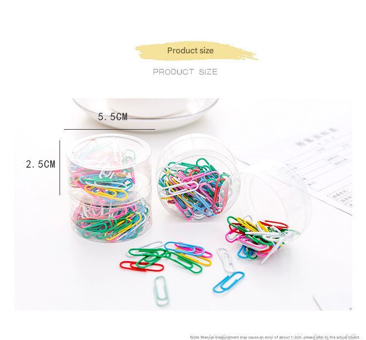 Collection of colorful paper clips on desk