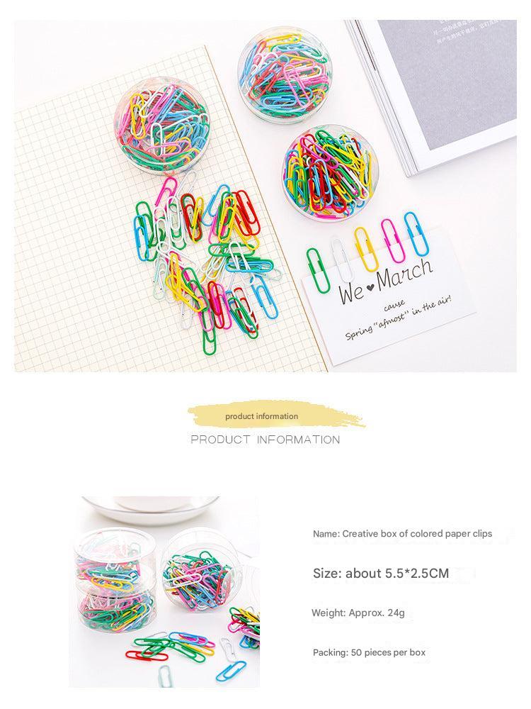 Vibrant multi-colored paper clips spread out