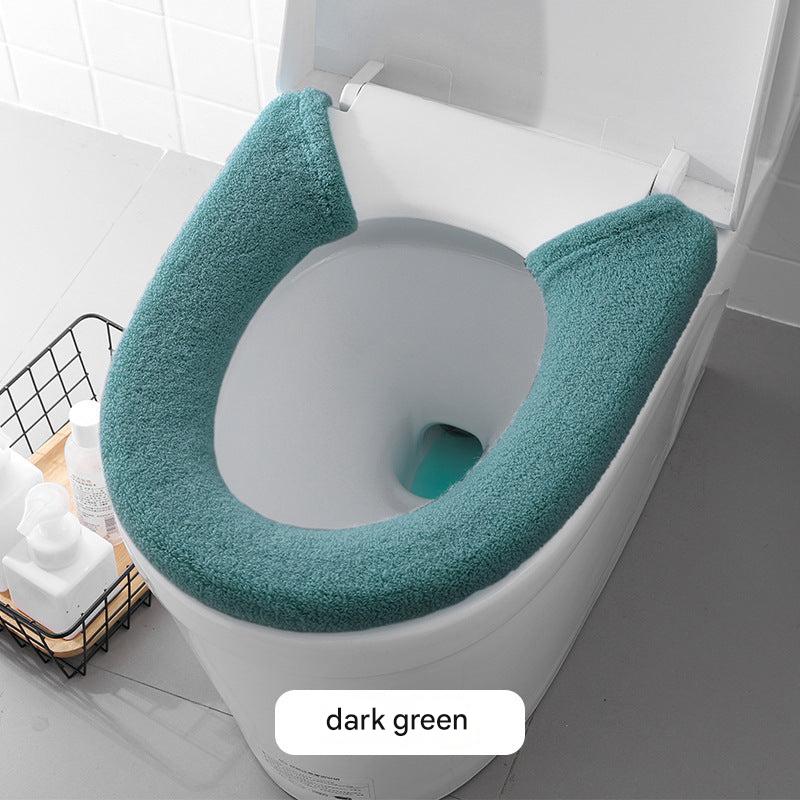 grey plush toilet seat cover with button