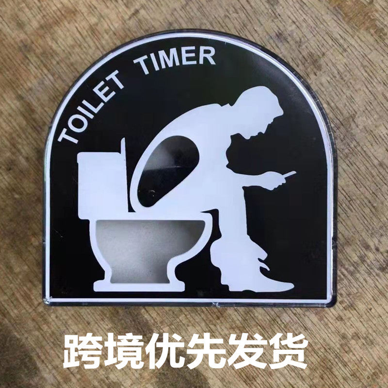 novelty toilet timer on bathroom counter