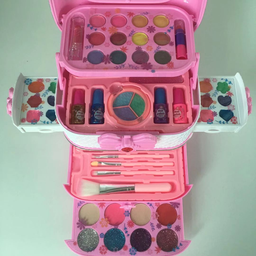 open makeup kit case with various children's cosmetics