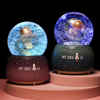 Space explorer themed snow globe music box with lights