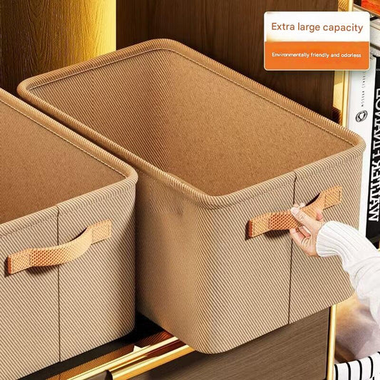 Modern foldable grey storage bin with items