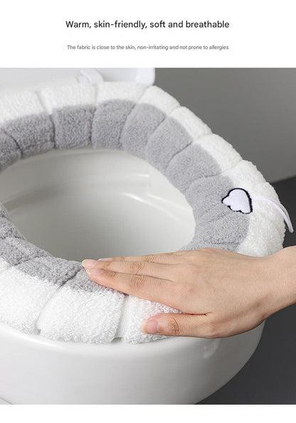 grey plush toilet seat cover with button