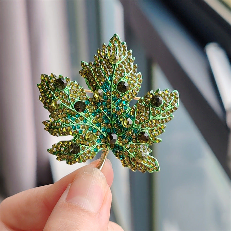 Elegant Alloy Leaf Brooch with Crystals - Image 1