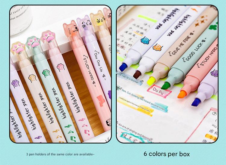 decorative cat paw box of pastel highlighters