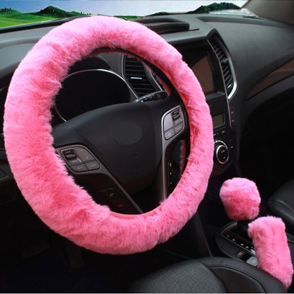 purple fur steering wheel cover in automobile setting