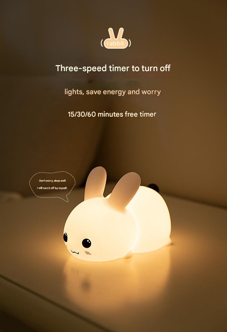 touch-sensitive Rabbit LED night light on white background