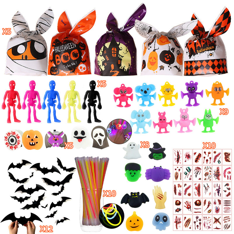 Assorted halloween toys and candy jars for kids