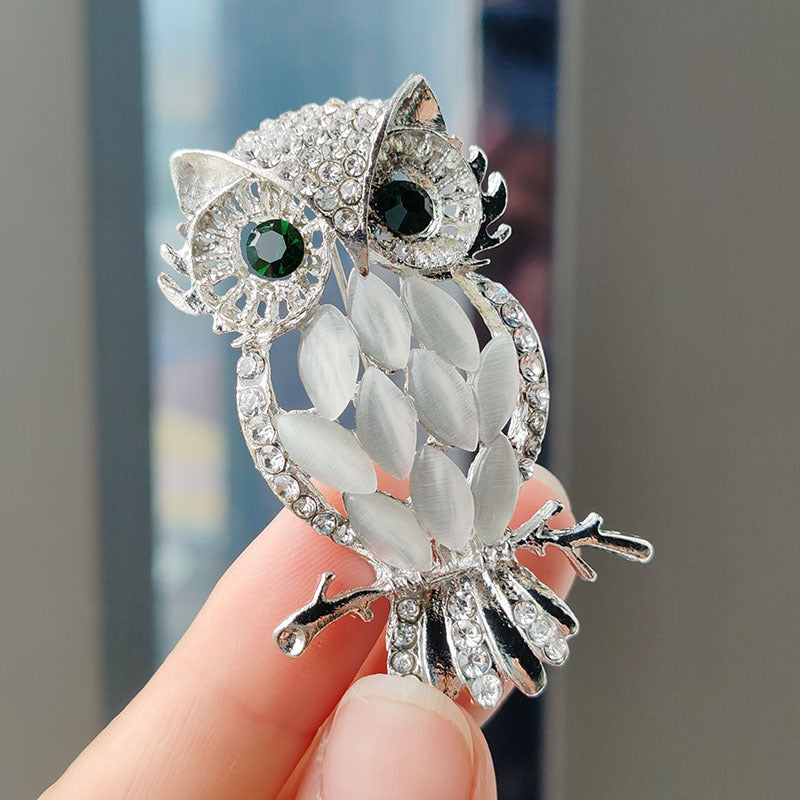 Owl brooch in gold and silver
