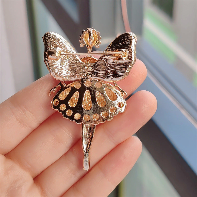 Alloy brooch on coat