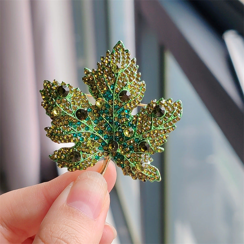 Elegant Alloy Leaf Brooch with Crystals - Image 1