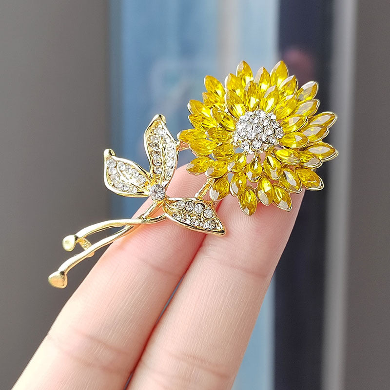 Elegant sunflower pin adorned with crystals