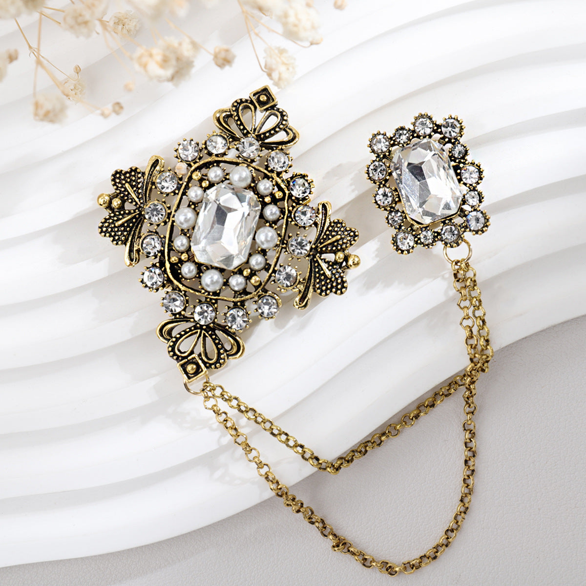 Necklace and Brooch Set on Display - Image 3
