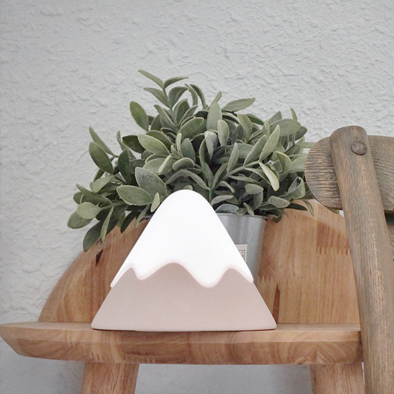 mountain-shaped LED night light on desk