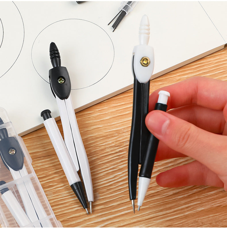 top view of drafting compass set with measurement scale