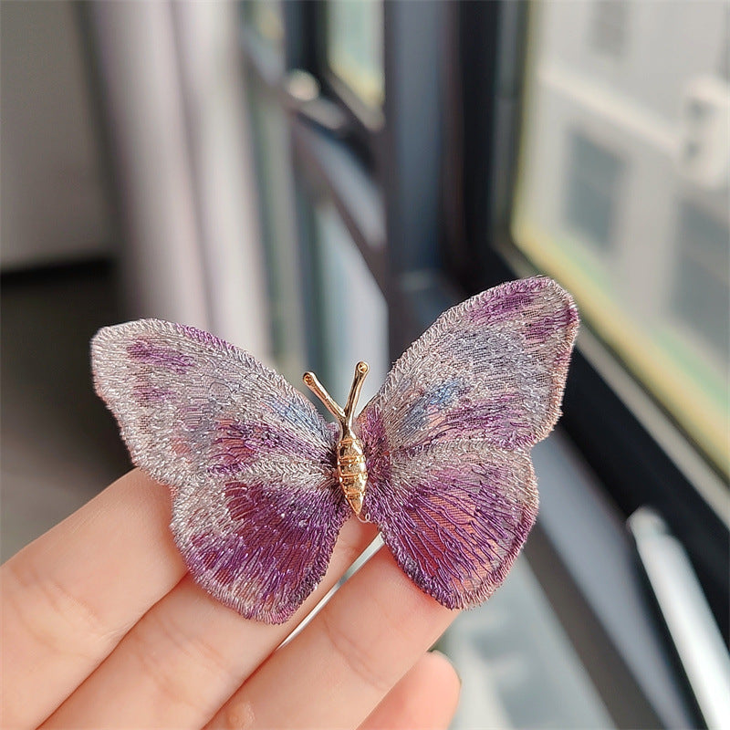 Close-up of butterfly brooch design