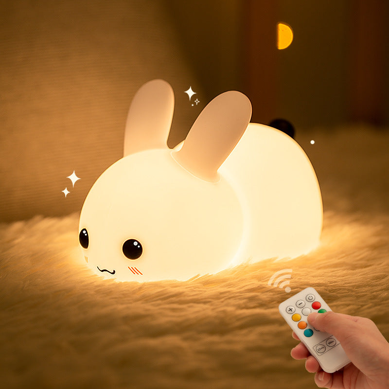 touch-sensitive Rabbit LED night light on white background