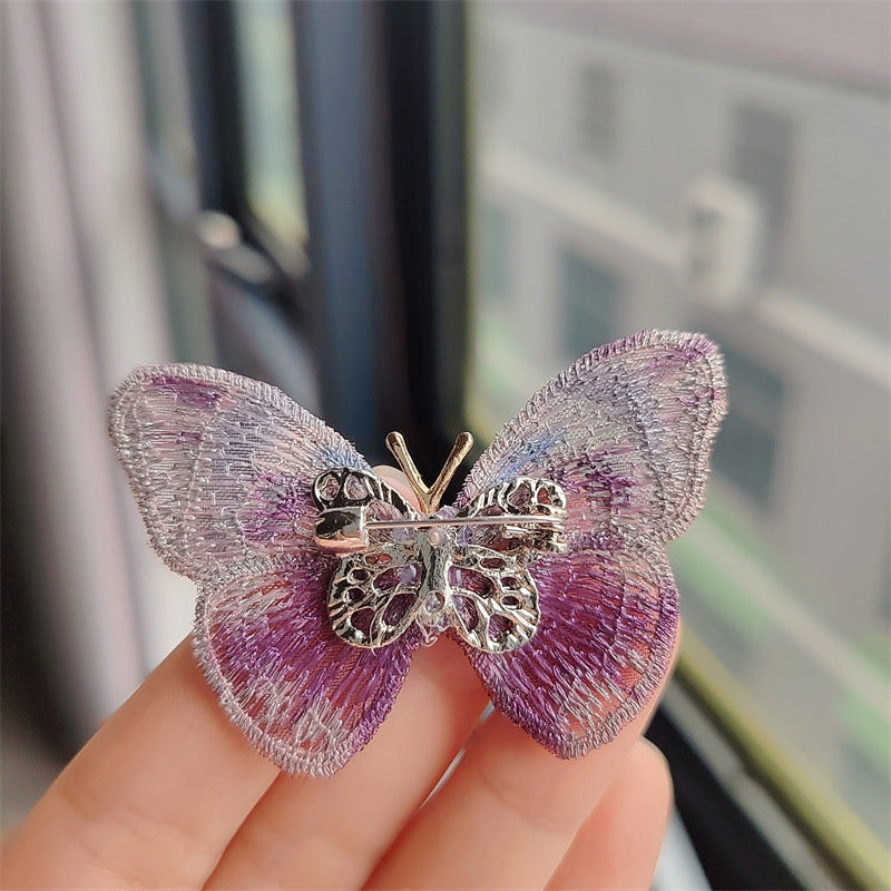 Butterfly embroidered brooch in green
